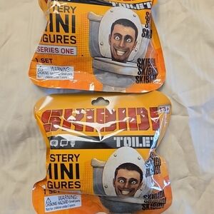 Skibidi Toilet Mystery Mini Figures Swriws One Set Of 2 Brand New